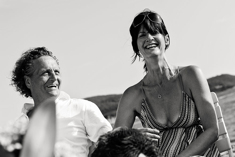 happy bride and groom on tuscany beach wedding