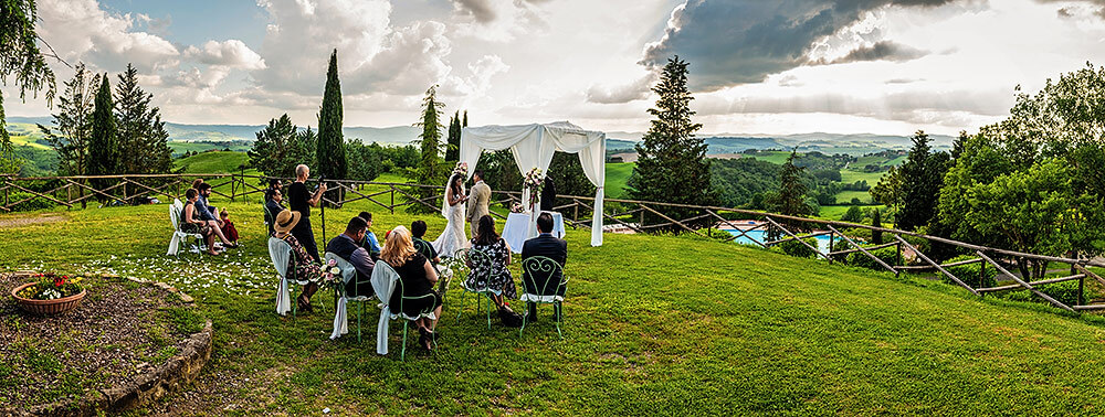 panoramic photo of a wedding ceremony in val d'orcia