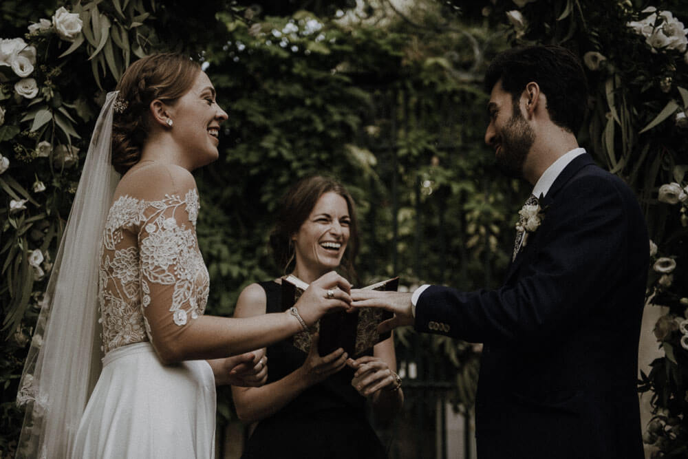 groom and bride exchange rings, destination wedding in florence, tuscany