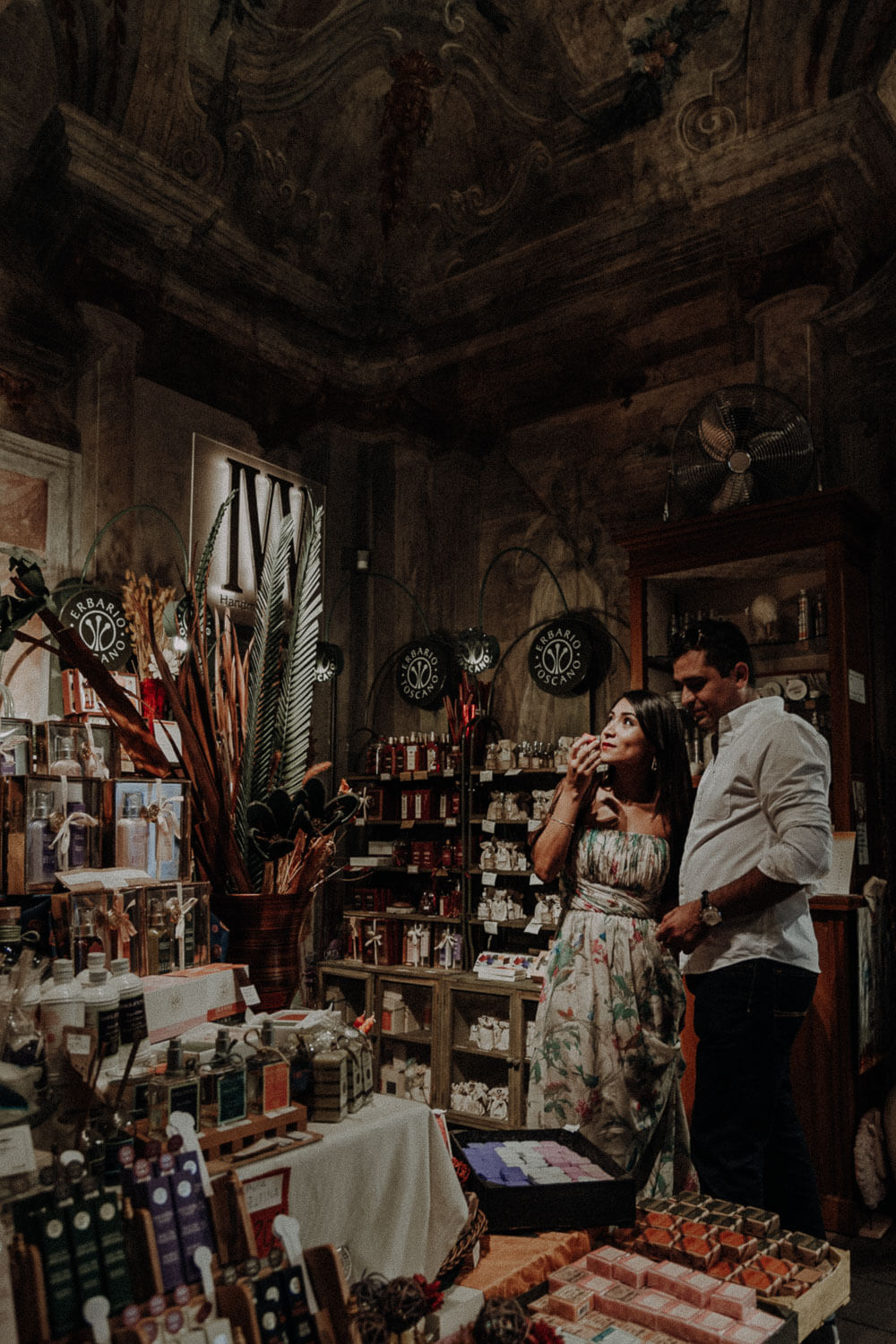 engaged couple in a characteristic Florentine shop