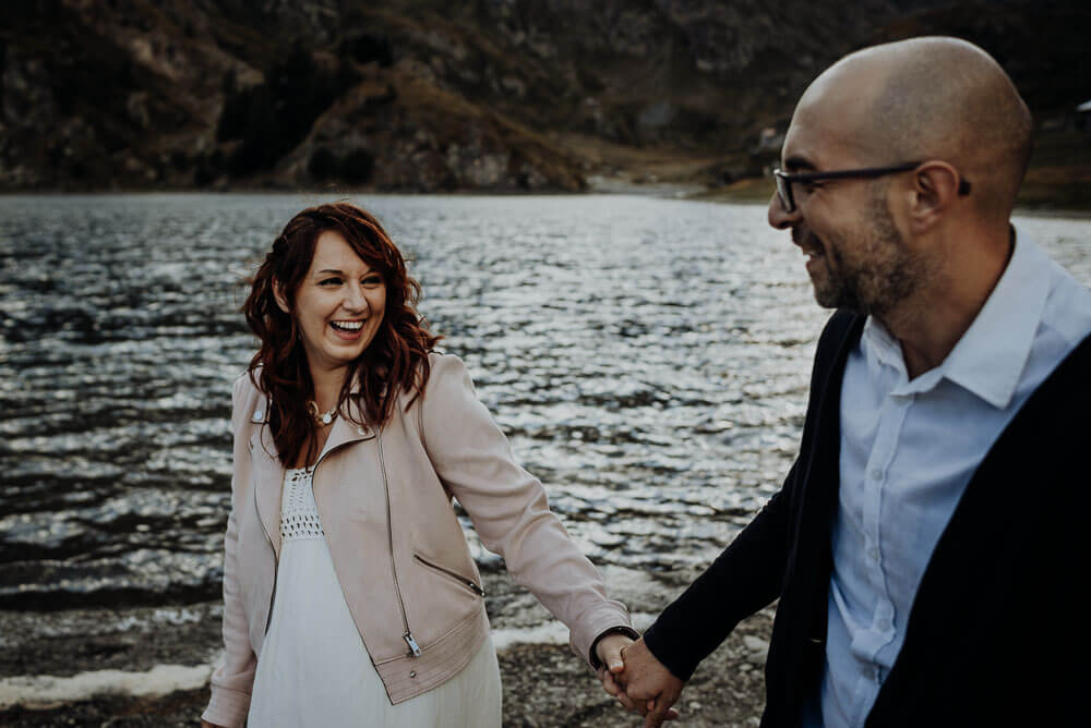 laughing couple, elopement wedding on alps
