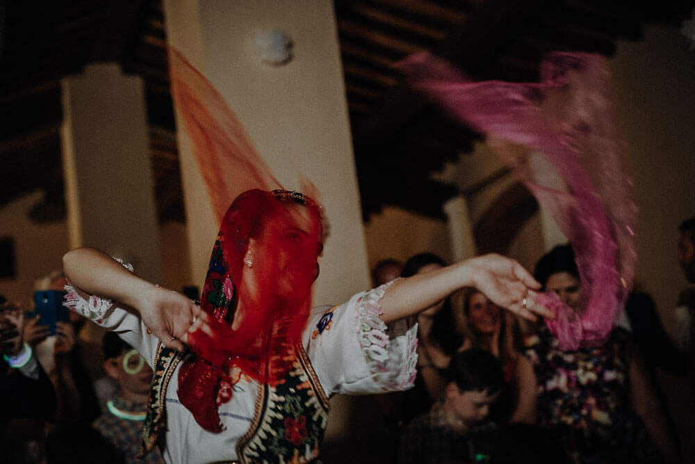 albanian traditional dances during destination wedding party in tuscany