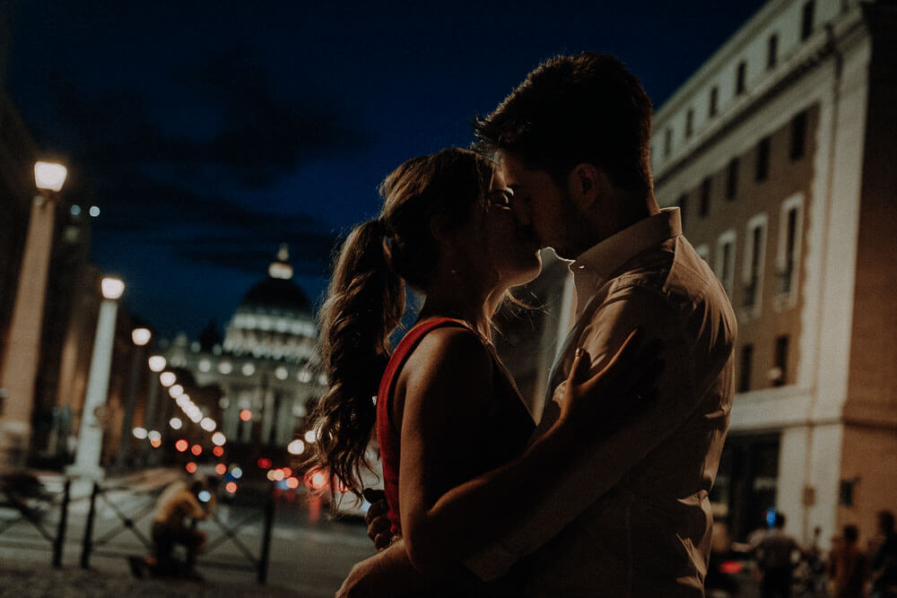 engaged couple kissing, vatican and rome engagement photographer